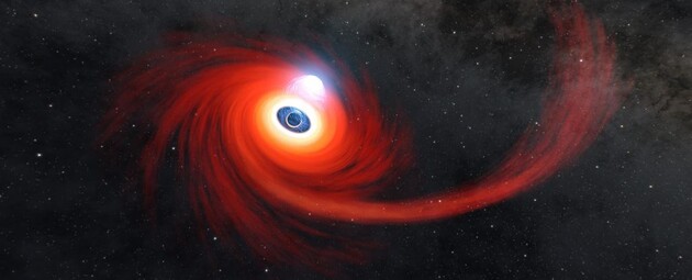 Съедает по Солнцу каждый день: ученые нашли самую «голодную» черную дыру